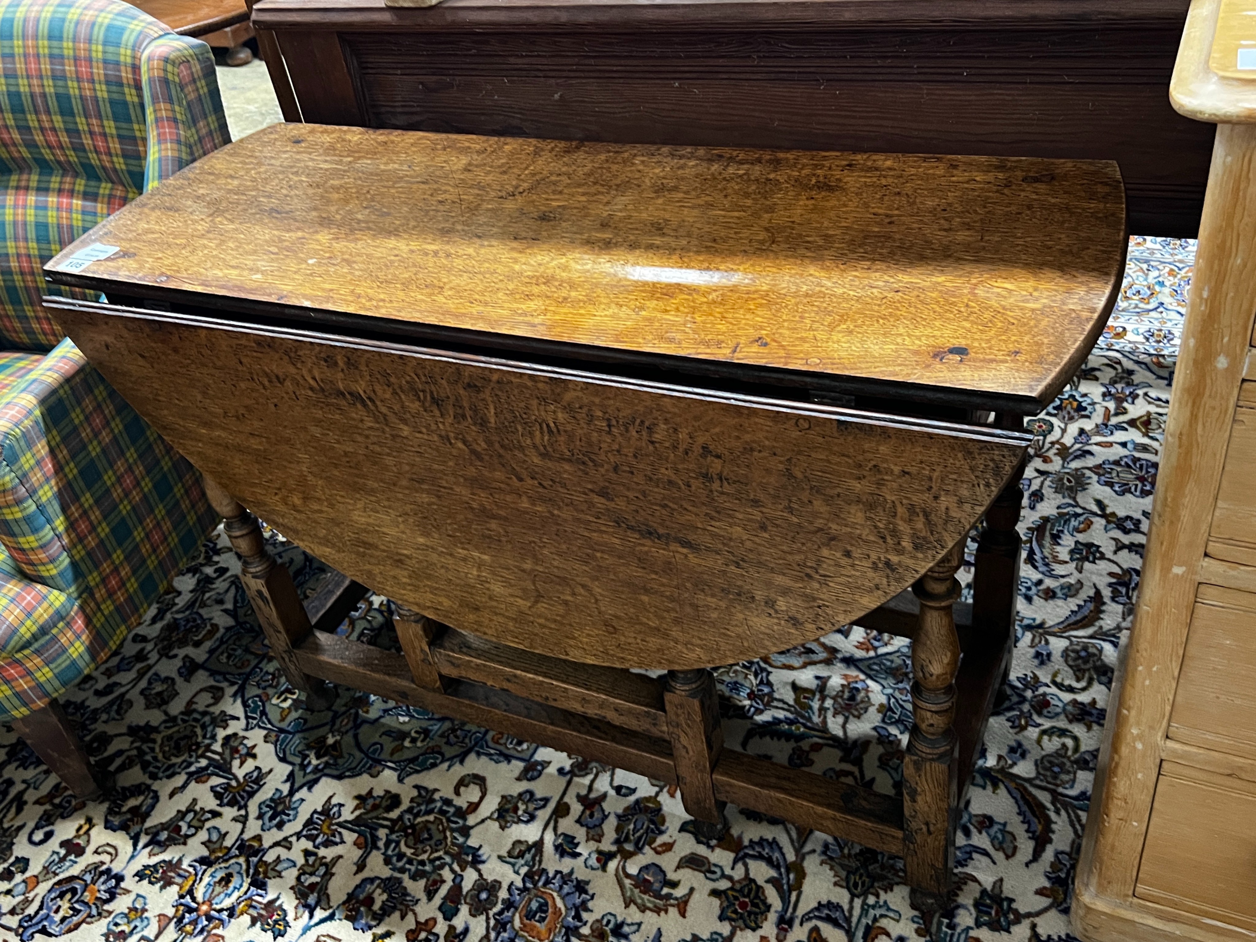 An 18th century oak gateleg table, length 102cm, depth 40cm, height 71cm